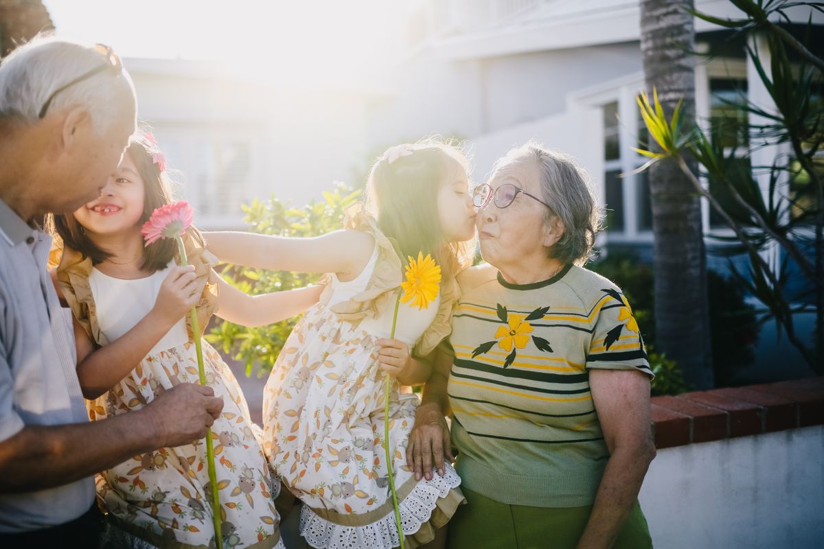 Grandchildren with their grandparents — generations of a family together